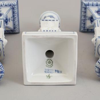 Two pairs of porcelain candlesticks by Royal Copenhagen, Denmark, third quarter of the 20th century.