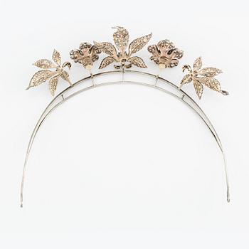 A silver and gold tiara with old-cut and rose-cut diamonds.