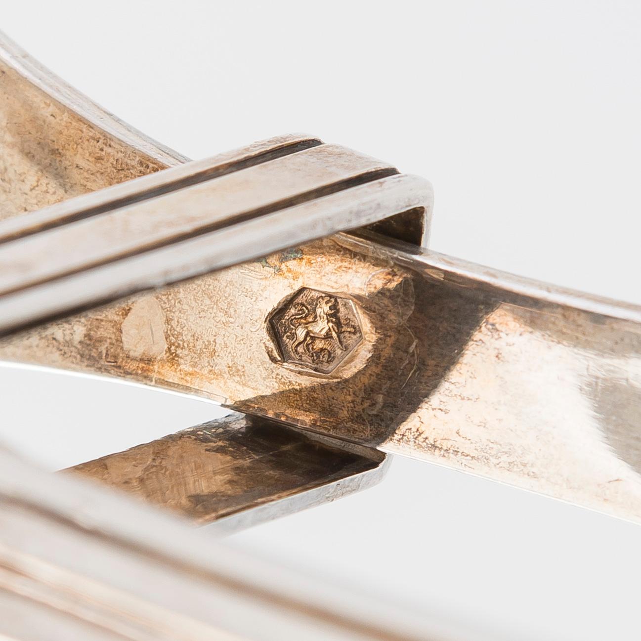 Serveringsbestick, 3 st, silver, Holland 1883-1975, och ostknappar, silver, Finland 1971.