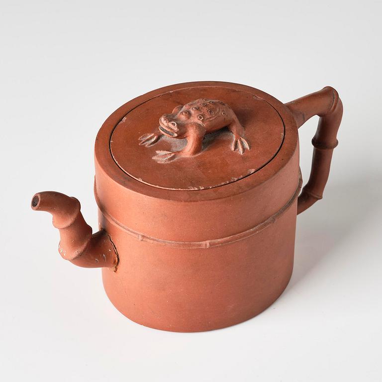 An yixing 'toad' tea pot with cover, Qing dynasty, 18th century.