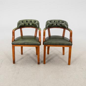 A pair of leather armchairs from the second half of the 20th century.
