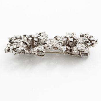 Brosch platina med runda briljant- och åttkantslipade diamanter.