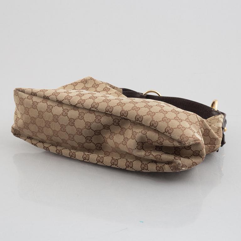 Gucci, a handbag.
