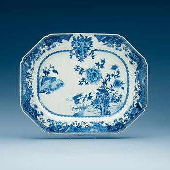 1734. A large blue and white armorial serving dish, Qing dynasty, Qianlong (1736-95).