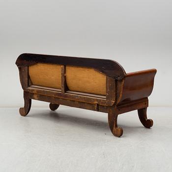 A late Empire sofa, first half of the 19th century.