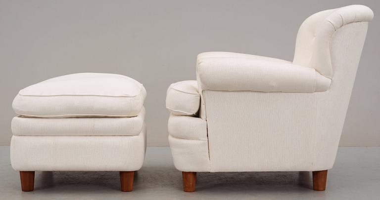 A Josef Frank armchair and ottoman, Svenskt Tenn.