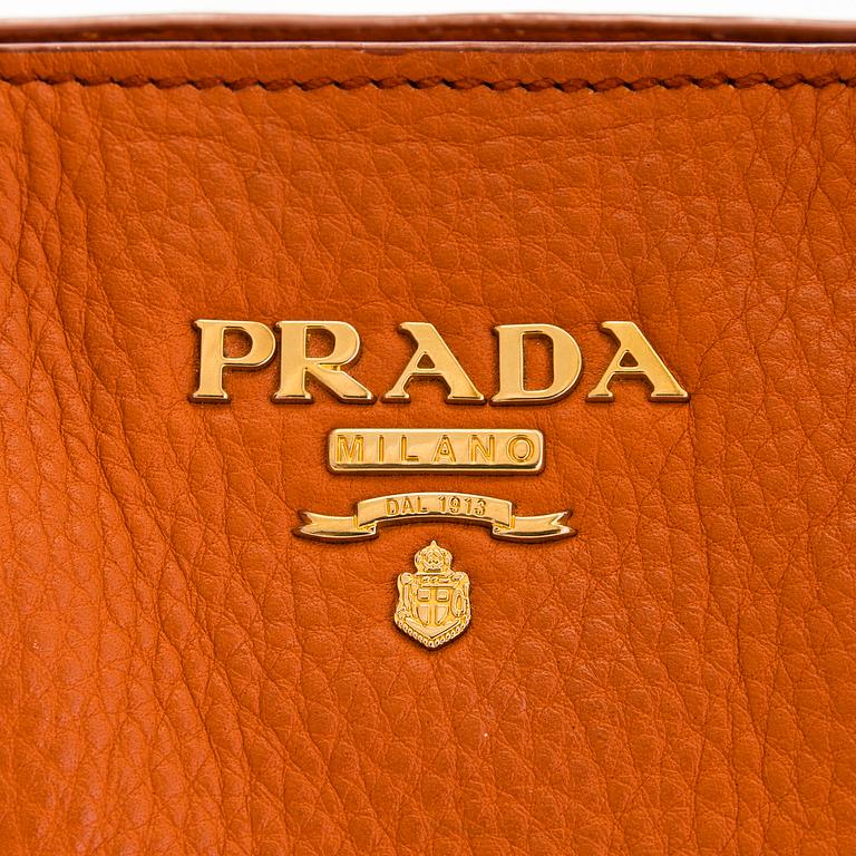 Prada, A 'Vitello Daino Tote' bag.