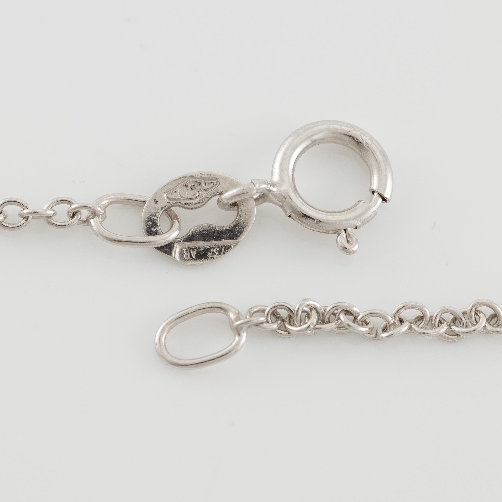 Collier 18K guld med två briljantslipade diamanter, medföljande report IGI.