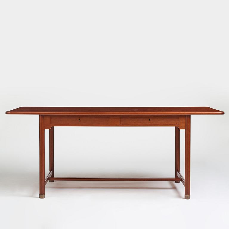 Mogens Koch, an important free standing mahogany desk by N.C. Jensen Kjær, Denmark 1930's.