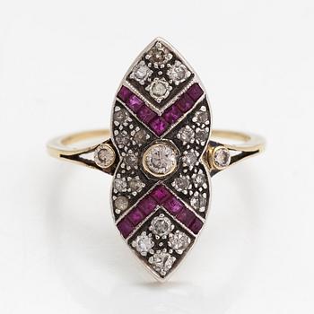 An 18K gold ring, brilliant- and single cut diamonds ca- 0.43 ct in total and rubies.