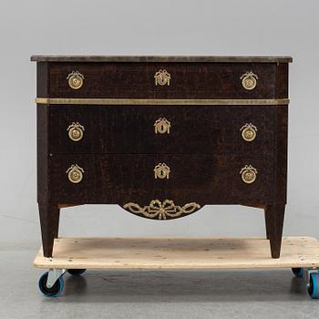 A gustavian style chest of drawers, early 20th century.