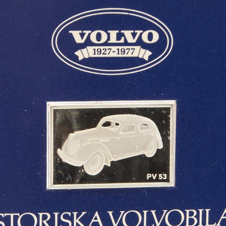 Twelve silver plaques with Volvo cars by Franklin Mint 1978.