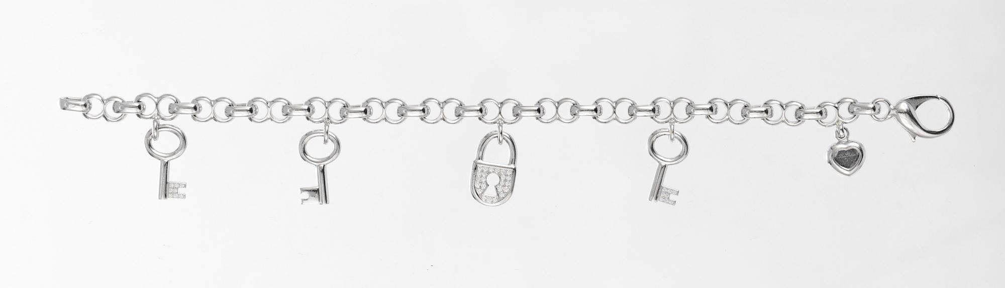 BRACELET, Chopard, five charms in the shape of heart, keys and locket.