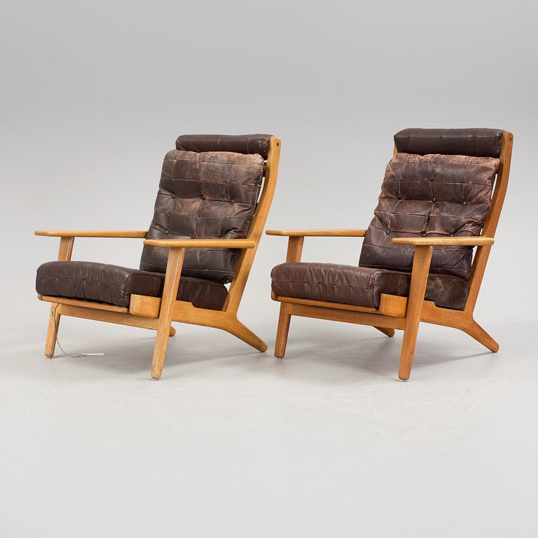 HANS J. WEGNER, a pair of oak 'GE 290' armchairs from Getama, Gedsted, Denmark.