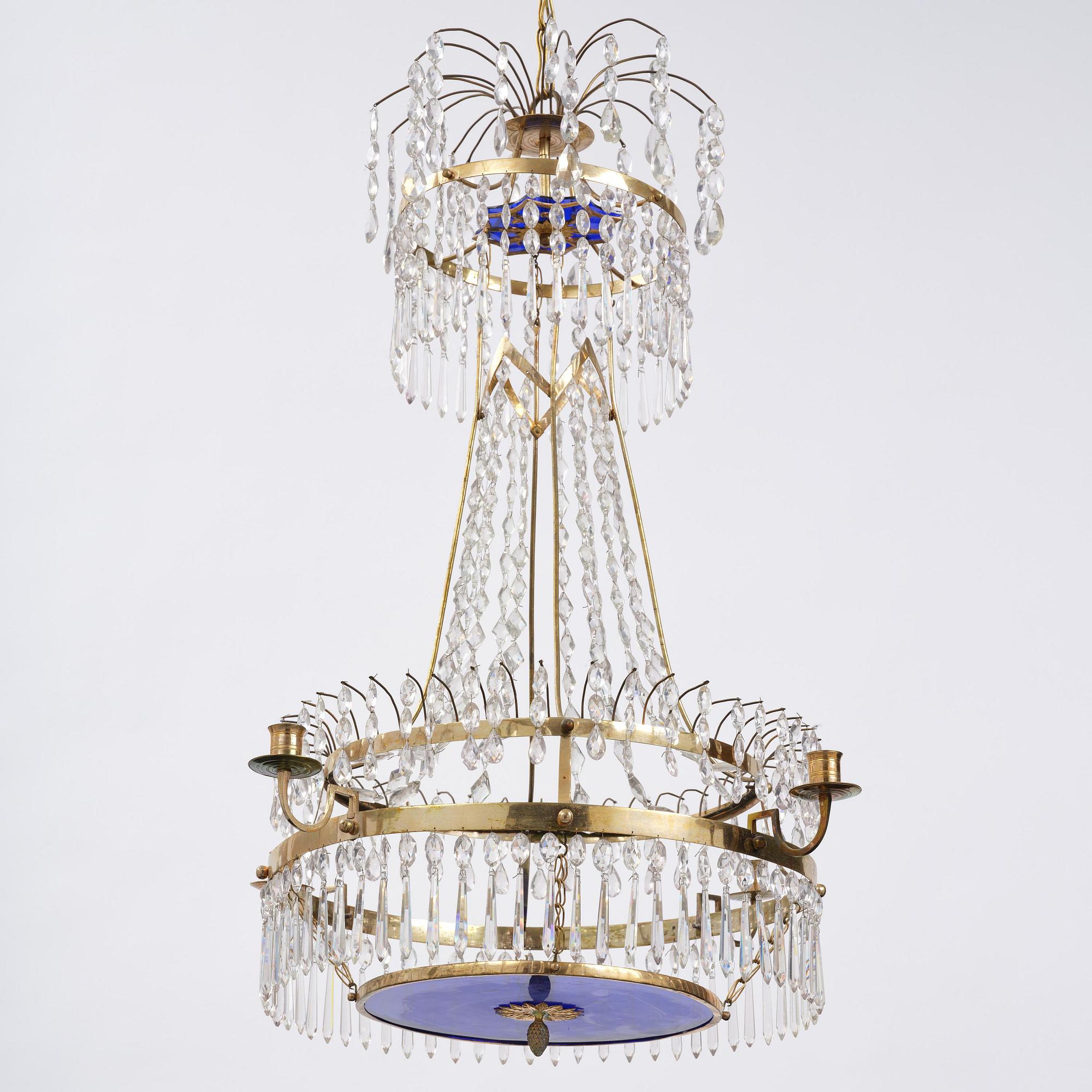 A late-Gustavian five-light gilt brass and cut glass chandelier, Stockholm, late 18th century.