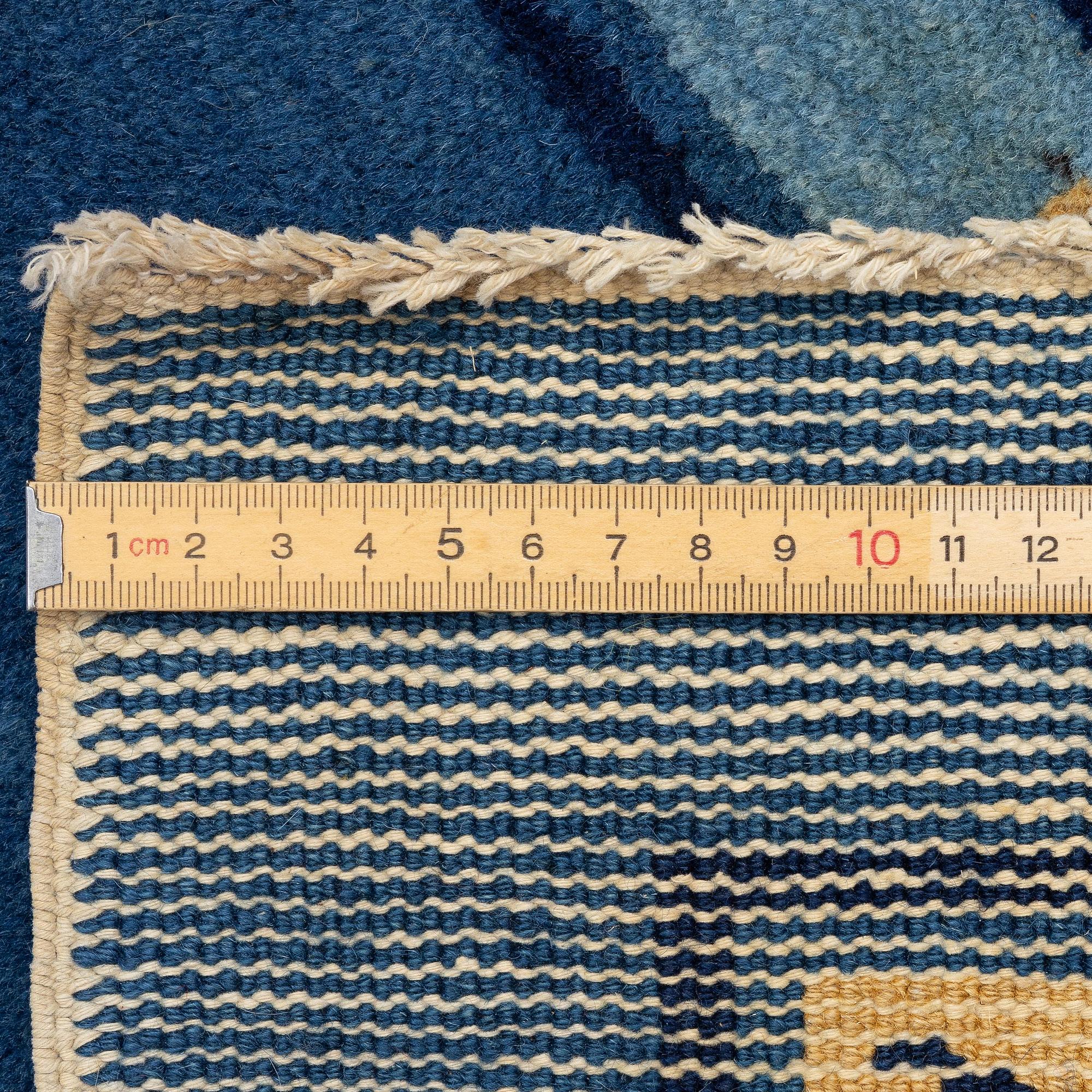 An antique, Beijing rug, north China, circa 1920. (243x163 cm).