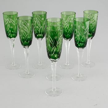 Eight champagne glasses from the 20th century.