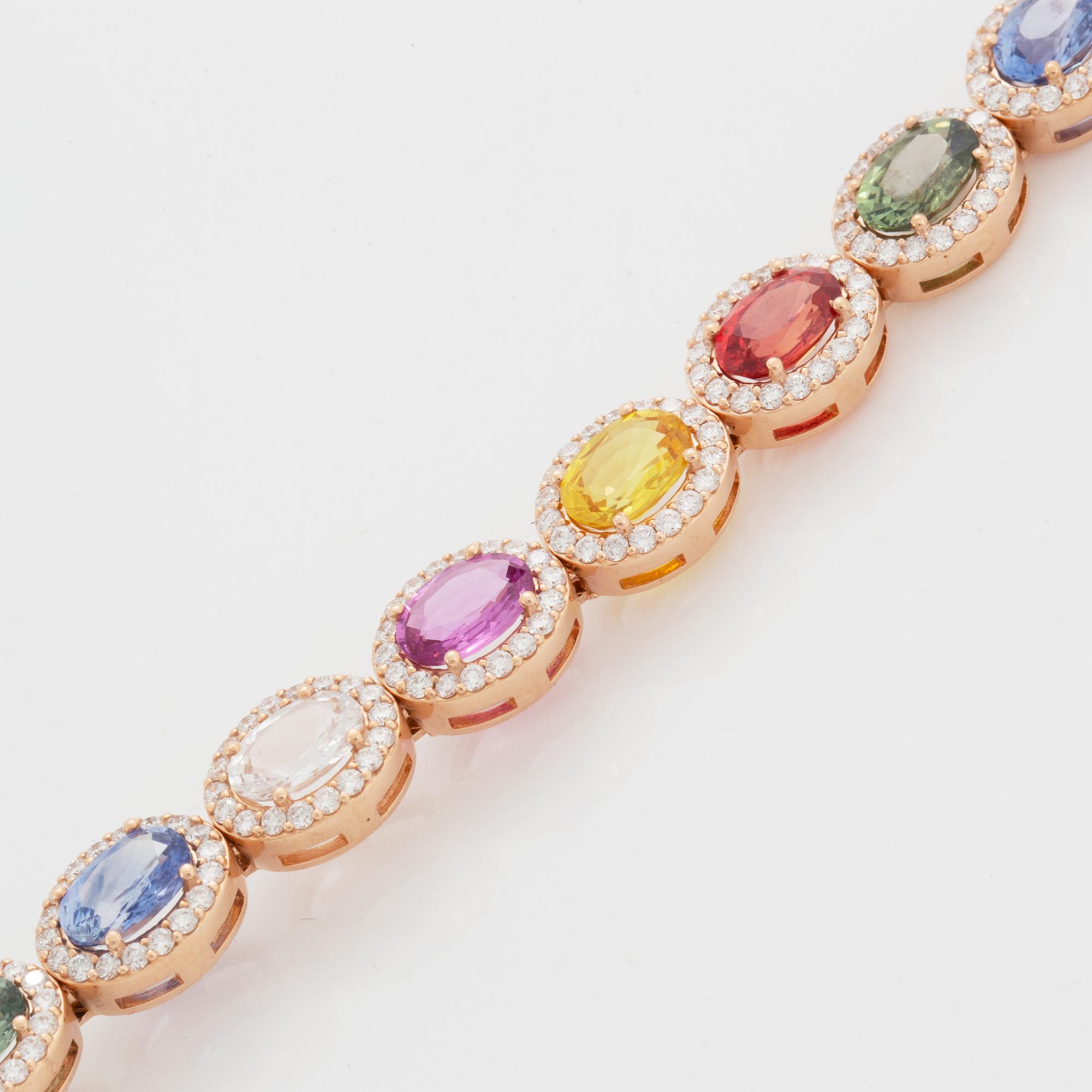 Multi coloured colour sapphire and diamond bracelet.