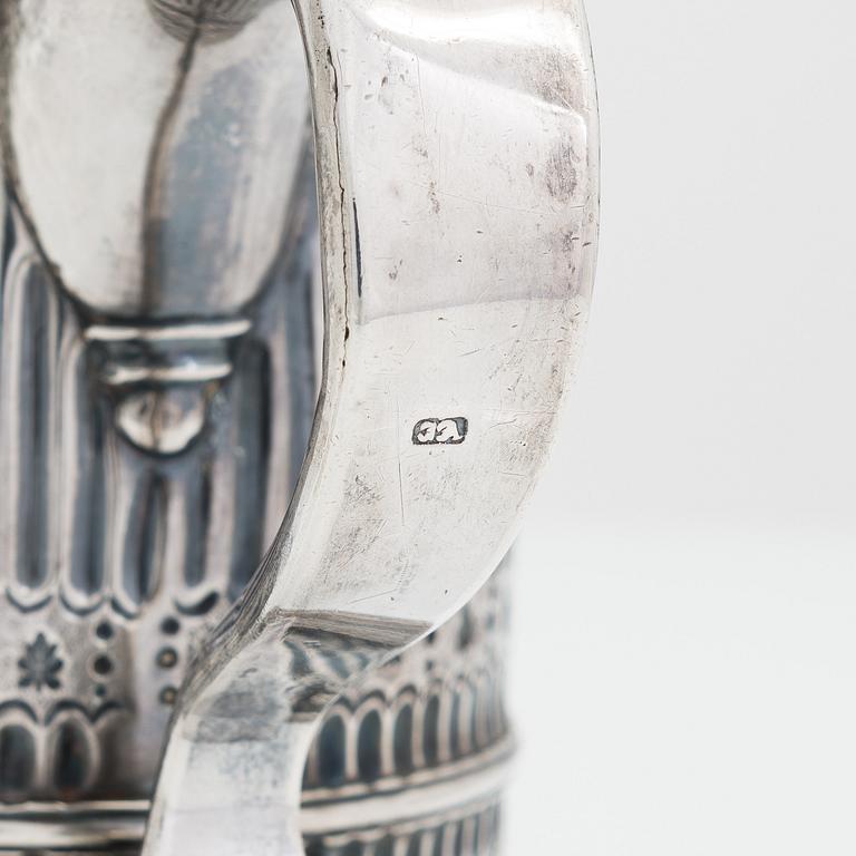 A sterling silver jug, London, unidentified marks.