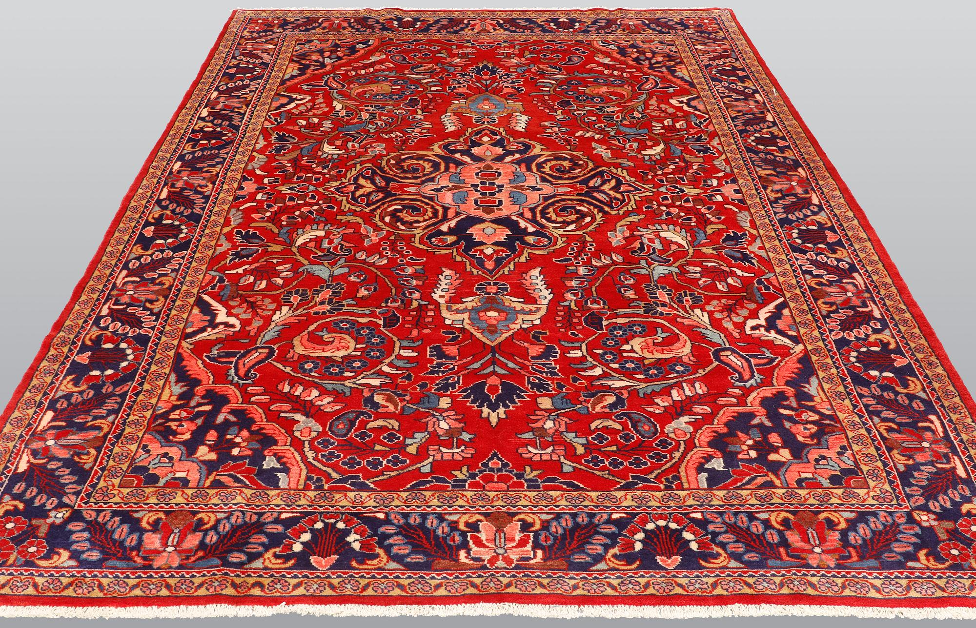 A carpet, Hamadan ca 327 x 220 cm.
