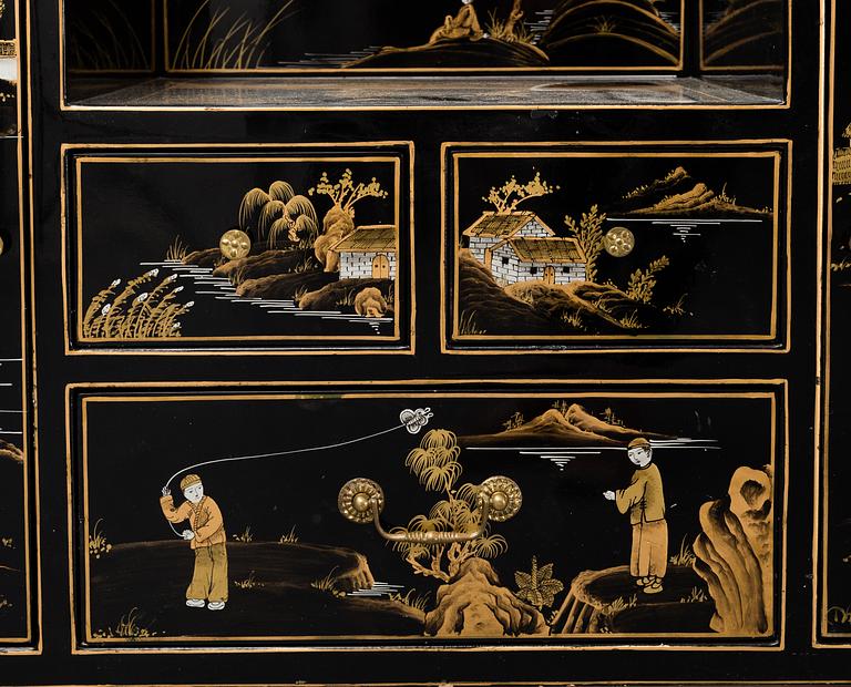 A Chinese lacquered dressing table and stool, 20th century.