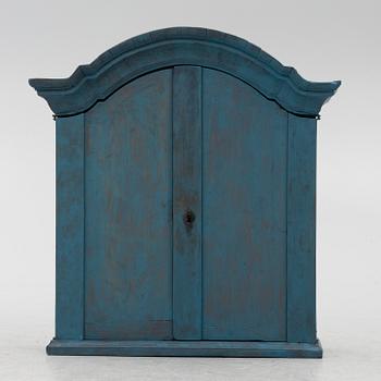 A wall cabinet, 18th century.