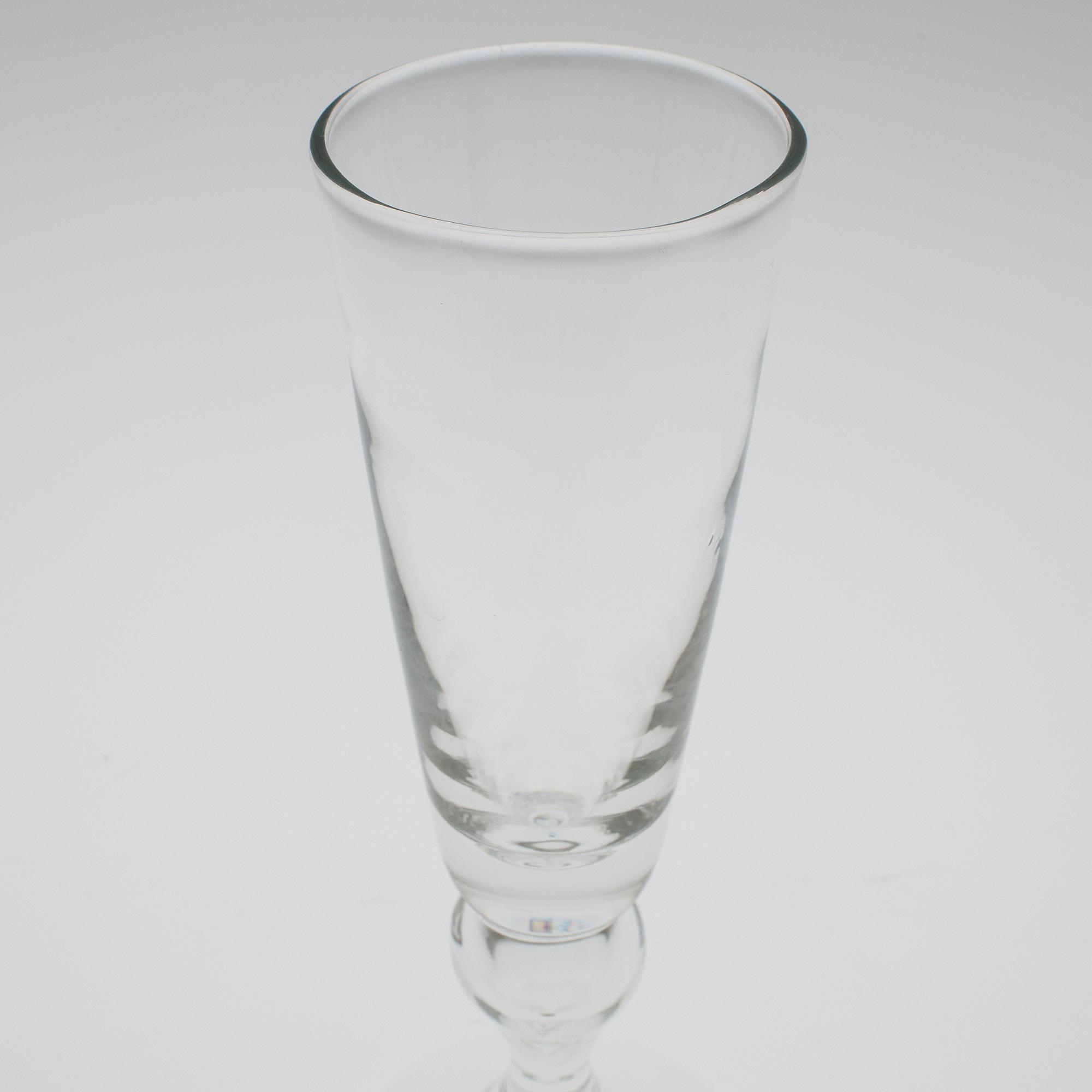 A set of twelve "Antik" wine glasses by Reijmyre Glasbruk.