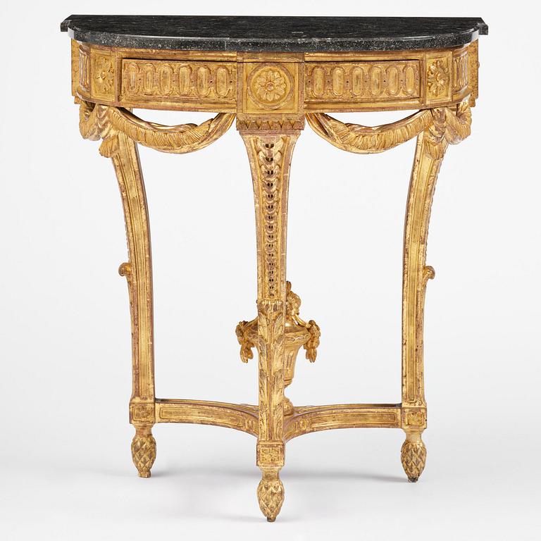 A Gustavian carved giltwood console table, Stockholm, late 18th century.