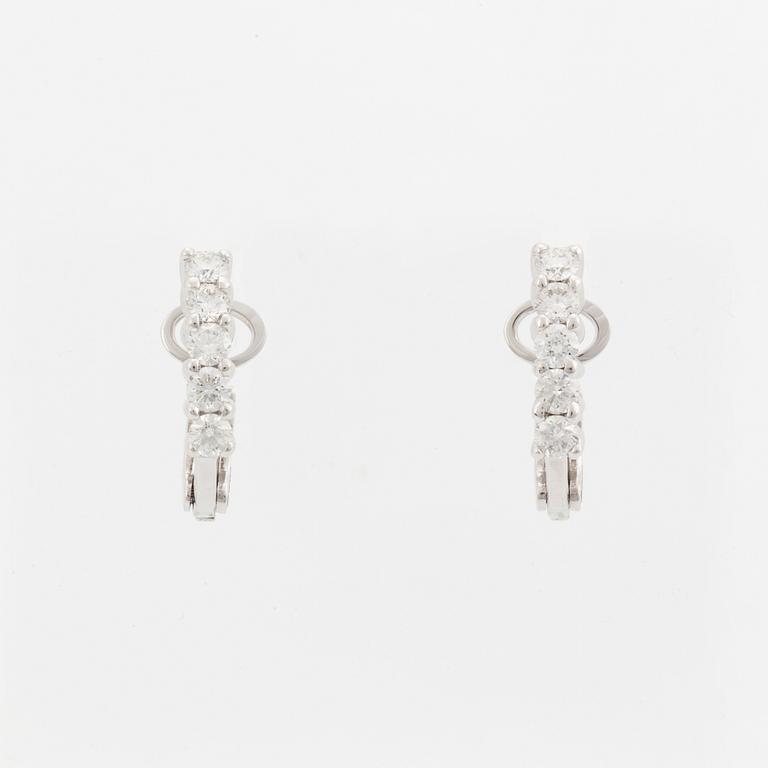 Brilliant-cut diamond earrings.