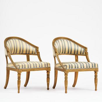 A pair of late Gustavian open armchairs attributed to E. Ståhl (master in Stockholm 1794-1820).
