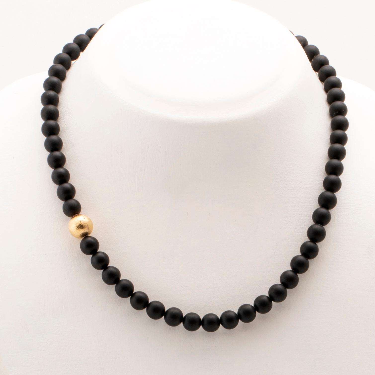 Ole Lynggaard, two necklaces and clasp in 18K gold.