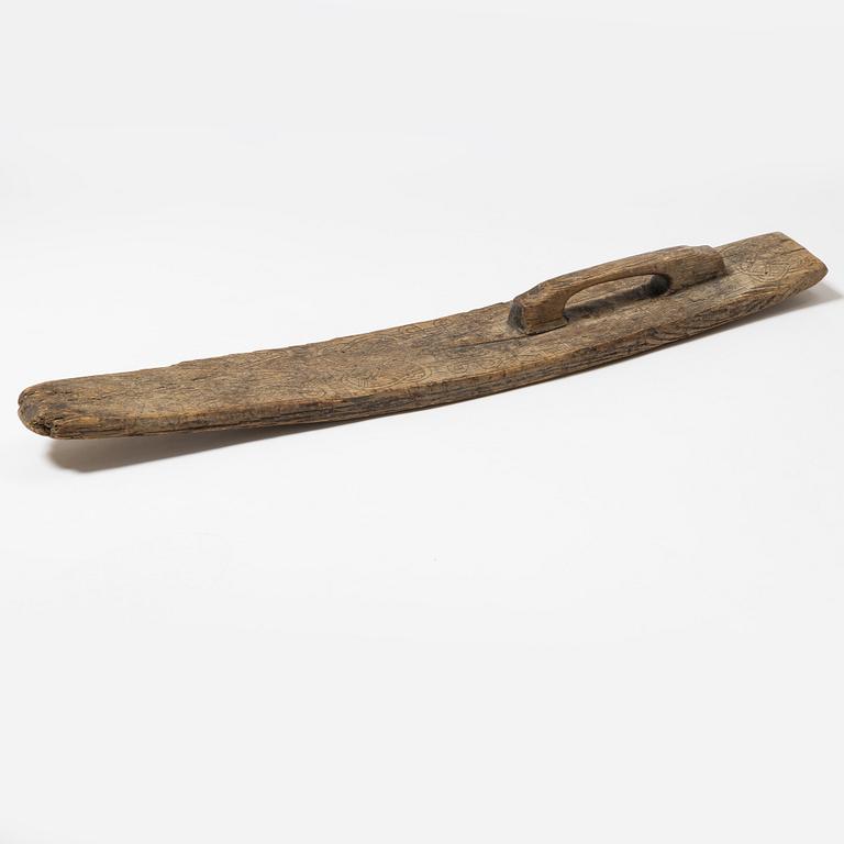 A Swedish folk art mangle board, dated 1666.