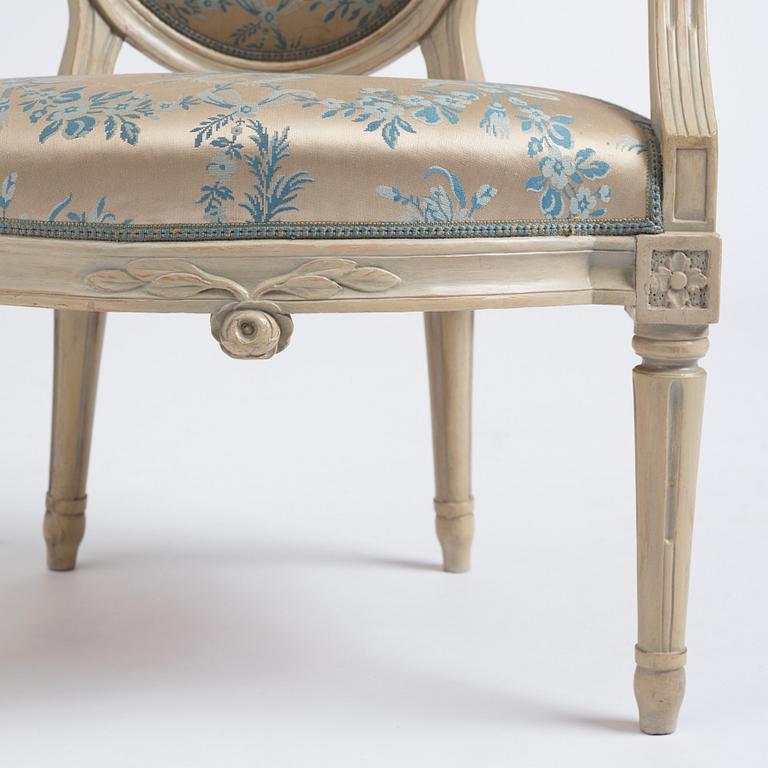 A pair of carved Gustavian chairs by J. Mansnerus (master 1756-1779).