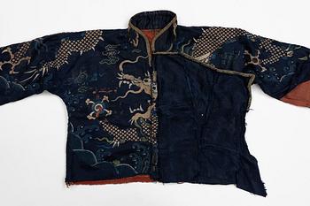 A rare fragment of a silk four clawed 'dragon' jacket, late Ming dynasty/early Qing dynasty.