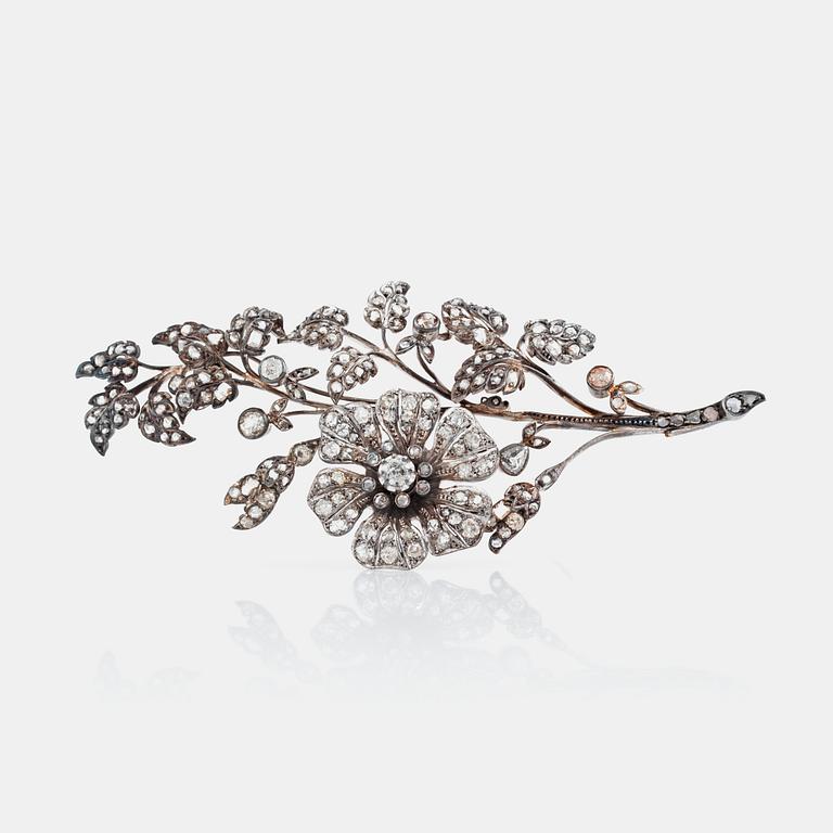 A old-cut and rose-cut diamond floral spray brooch.
