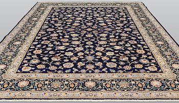 A Keshan carpet, approx. 418 x 311 cm.