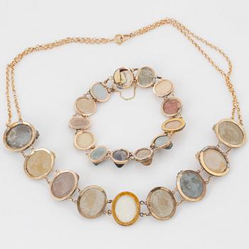 Silver and lava cameo necklace and bracelet.