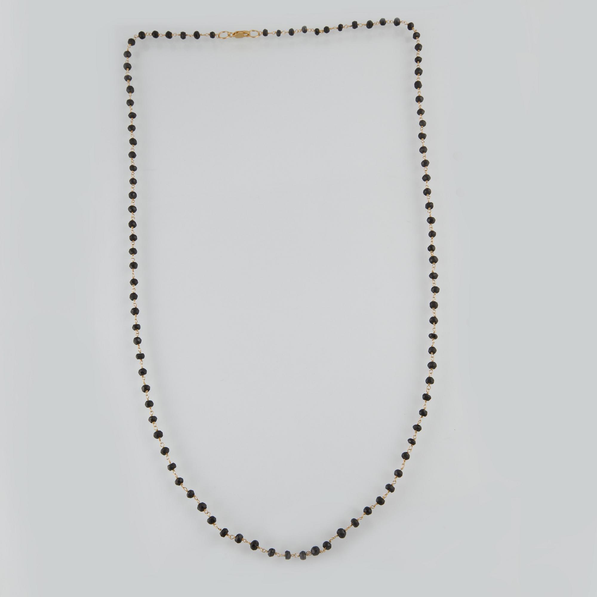 COLLIER, förgyllt sterlingsilver med fasettslipade svarta spinneller. Vikt 13,2 gram.
