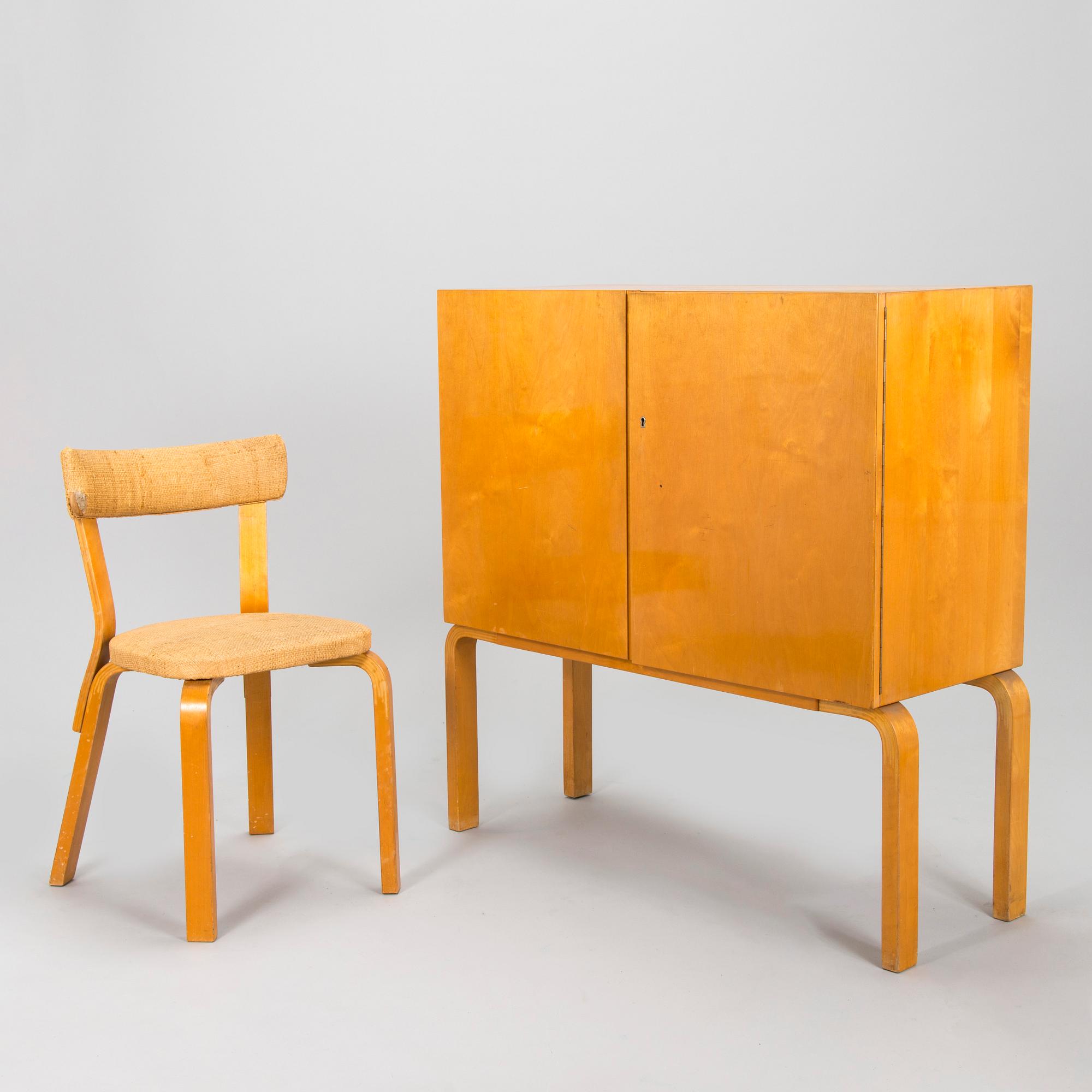 Alvar Aalto, mid-20th century '810' cabinet and a 
'69'chair Oy Huonekalu- ja Rakennustyötehdas Ab.