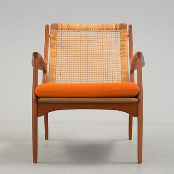 S A ANDERSEN, ERIK ANDERSEN & PALLE PEDERSEN, a teak and rattan easy chair from Horsnaes, Horsens, Denmark, 1960's.