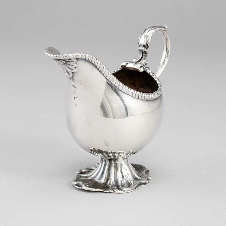 An English 18th century silver sauce-boat, unidentified makers mark, London 1764.