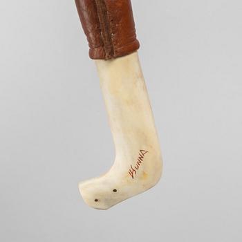 Lars Levi Sunna, a reindeer horn knife, signed.