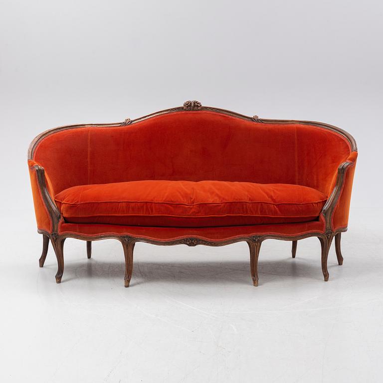 A Louis XV sofa, France, mid 18th Century.