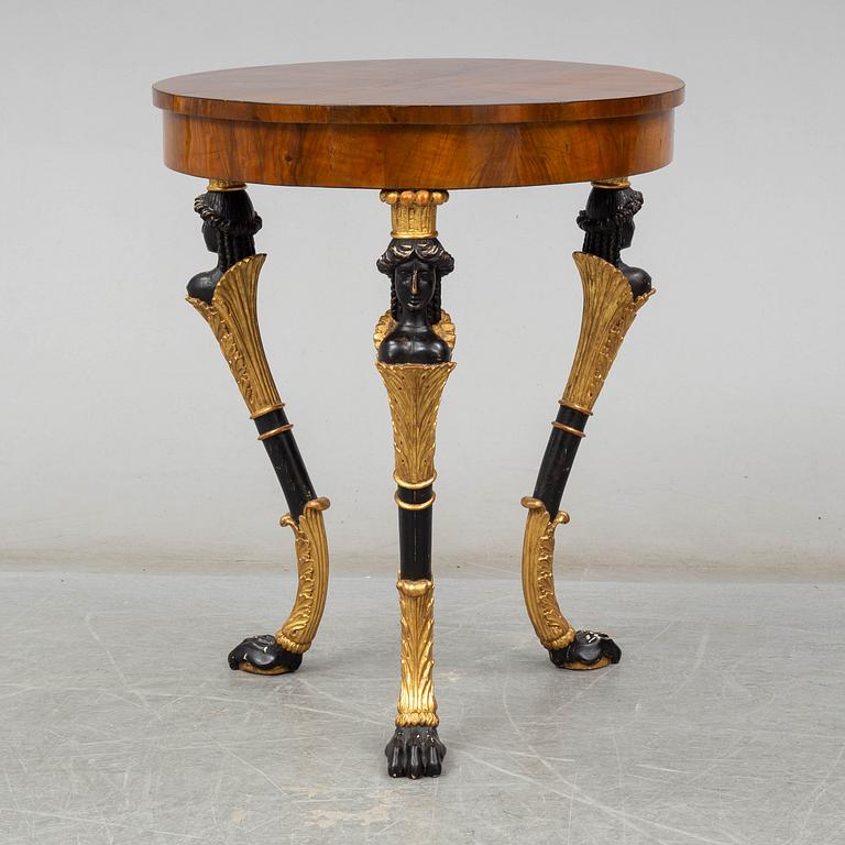 An Empire table, probably Austria. Early 19th century.