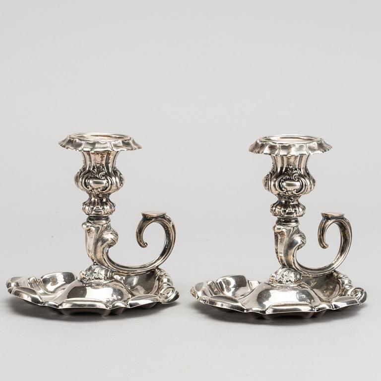 JOHAN OLOF ÖSTLUND, a pair of candlesticks Gävle 1862.