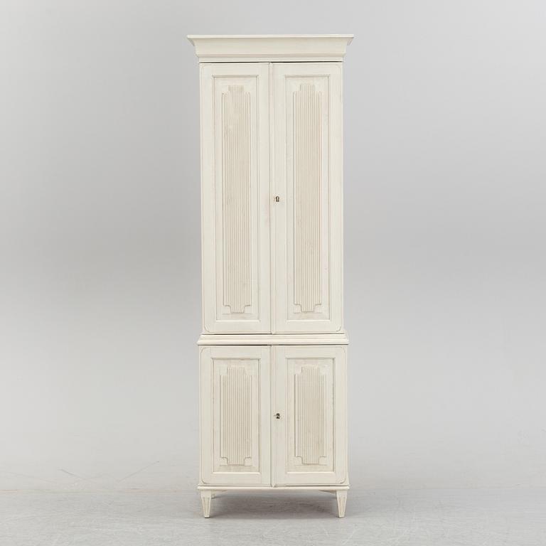 A contemporary Gustavian style cabinet.