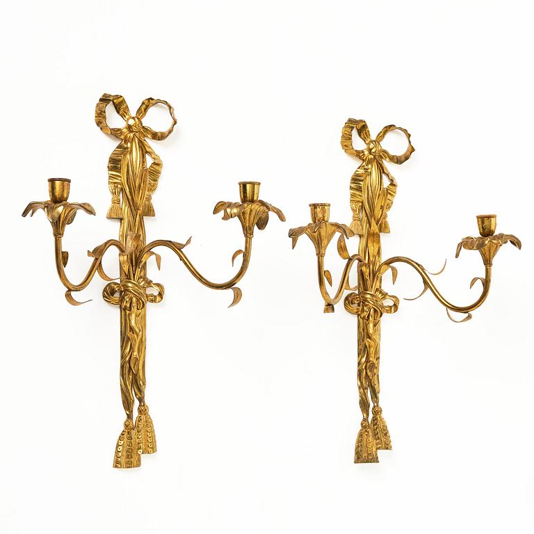 A pair of gilt bronze two-branch appliques after F. L. Rung, late 19th century,