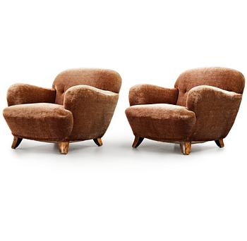 246. A pair of Mid century Modern easy chairs, probably 1939.