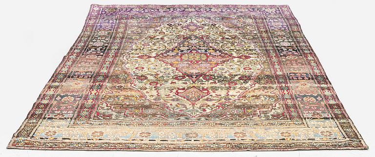 An antique silk Kashan rug, Central Persia, c. 207 x 131 cm.