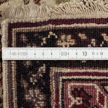 An antique Agra carpet, north India c. 430 x 392 cm.
